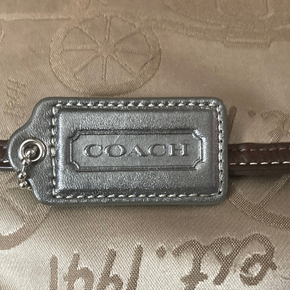 Coach replacement hangtag in dark grey metallic leather.